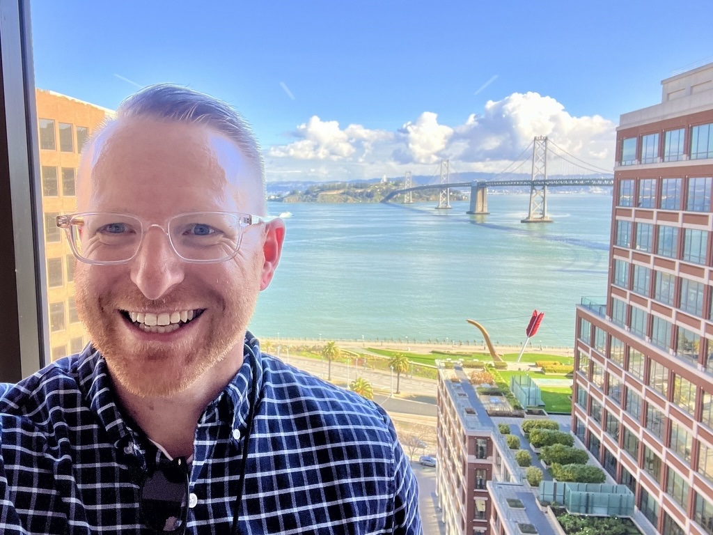 Jeff Ackley smiling with the Bay Bridge in the background